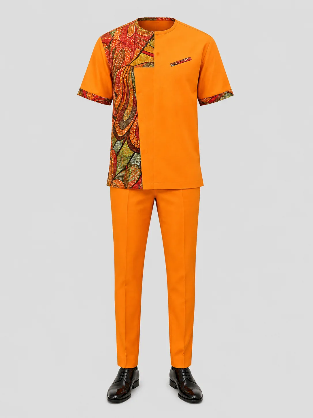 Men's orange short-sleeve shirt with a printed side panel and matching orange trousers