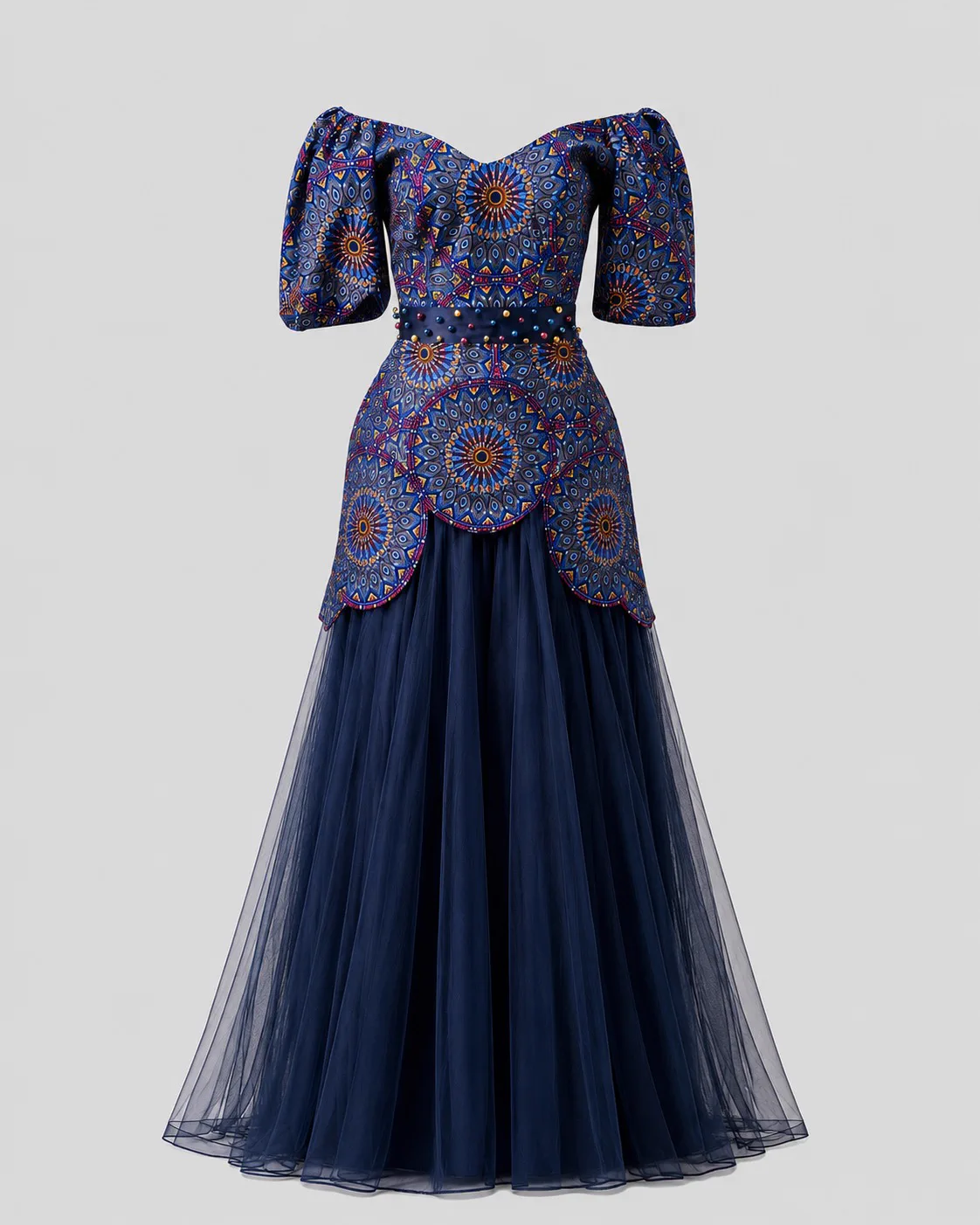 Navy off-the-shoulder gown with a puff-sleeve printed bodice and scalloped peplum over a tulle skirt