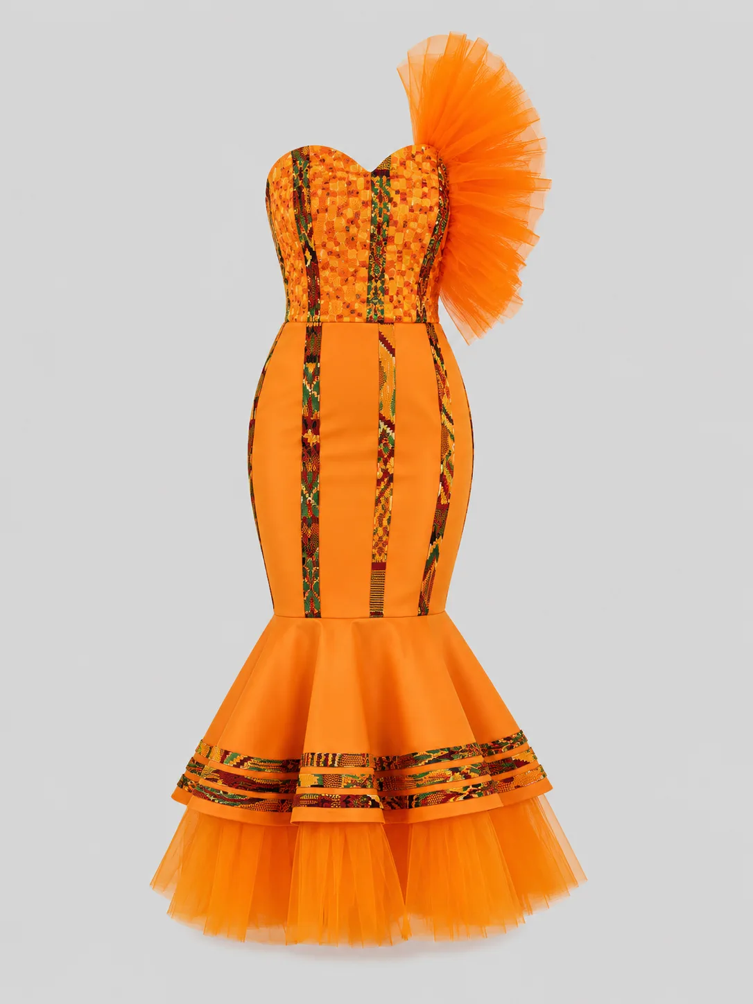 Orange strapless mermaid dress with printed panels and a tiered tulle hem