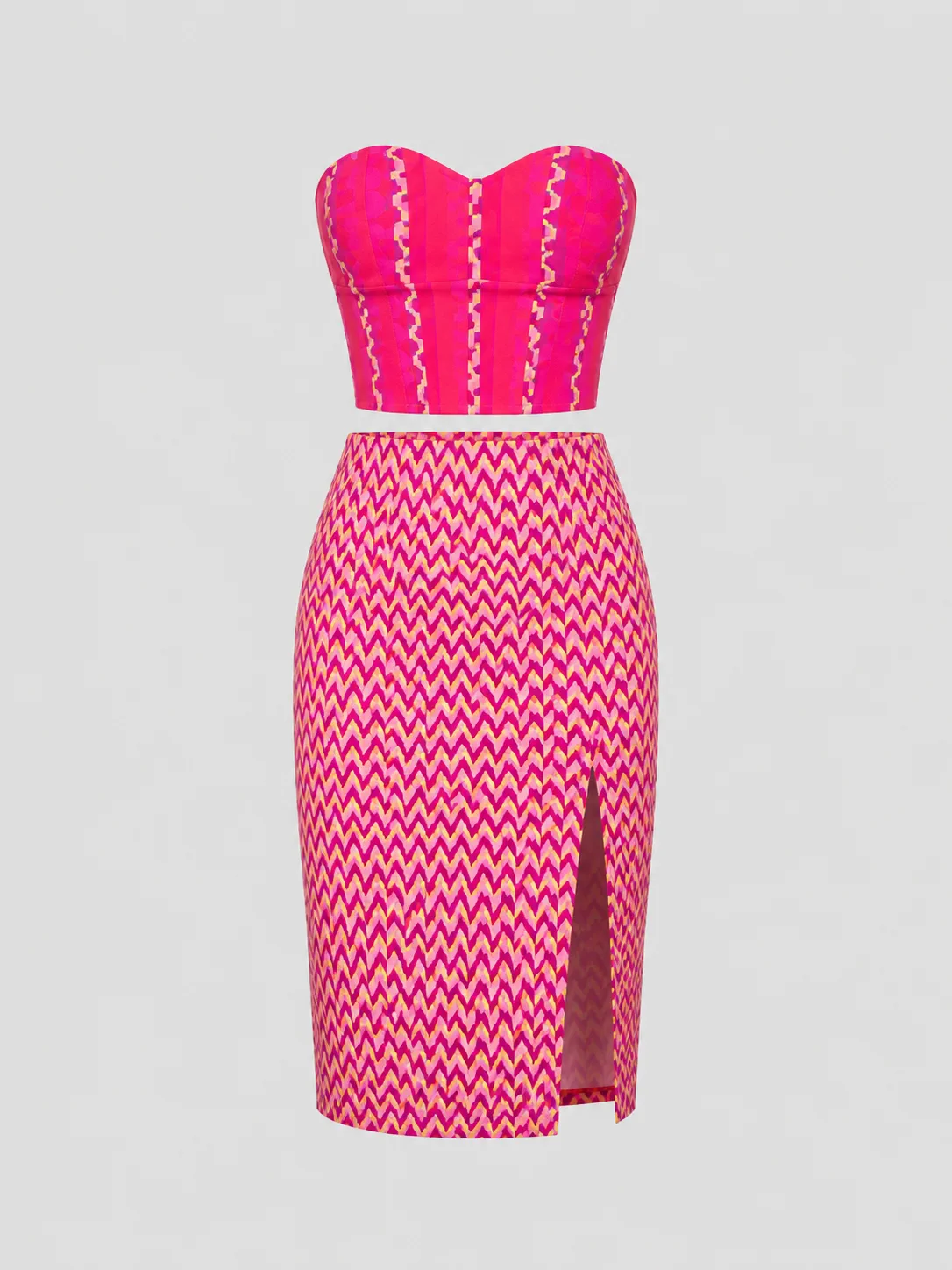 Two-piece set with a pink corset top and matching chevron-print pencil skirt with a front slit