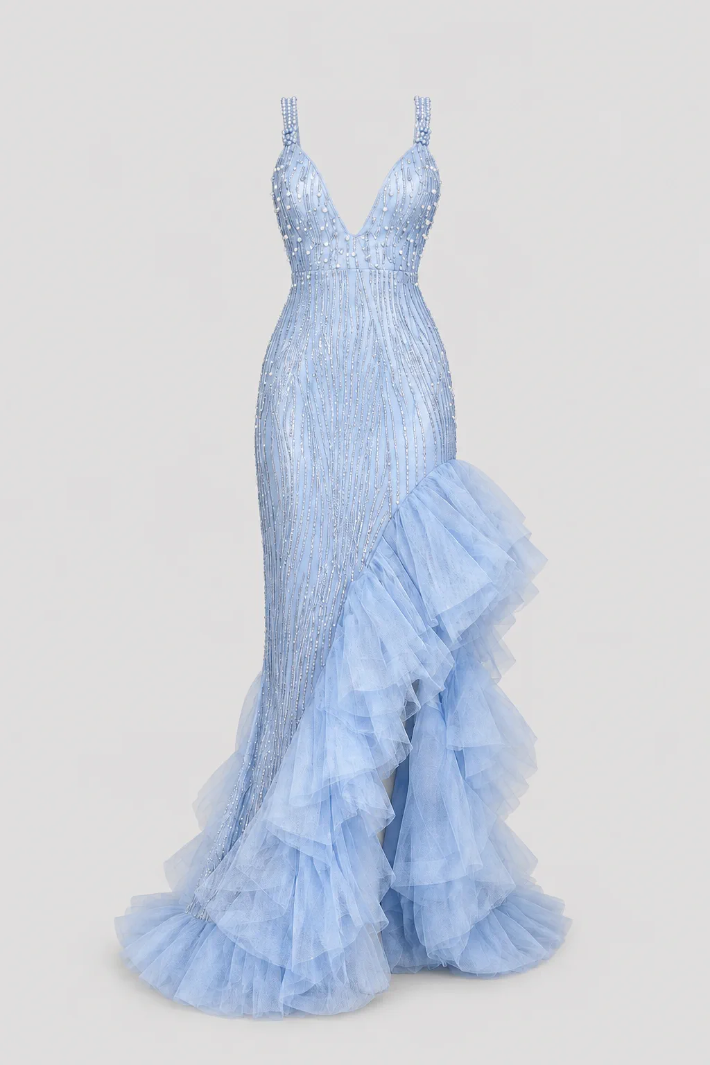 Powder blue beaded gown with a V neckline and layered ruffled tulle hem